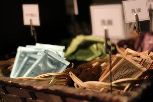 a wicker basket filled with different types of items at KOKO HOTEL Osaka Namba Ebisucho in Osaka