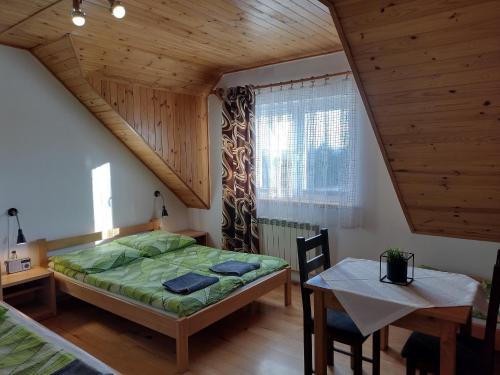 Postel nebo postele na pokoji v ubytování Jurajska Chata