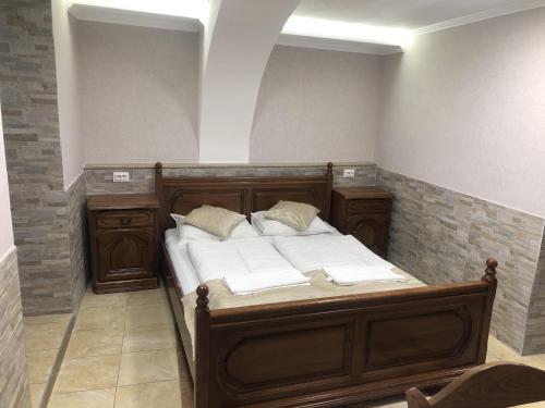 Postel nebo postele na pokoji v ubytování Mosoly Apartman