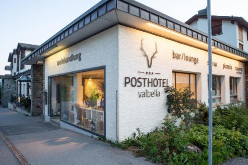 a store front of a post office building at Posthotel Valbella in Valbella