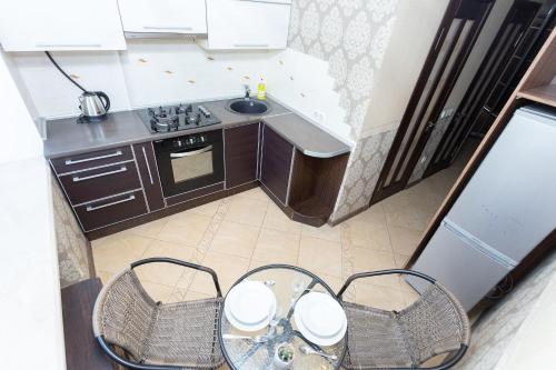 Η κουζίνα ή μικρή κουζίνα στο Kvartiras Minsk Apartments