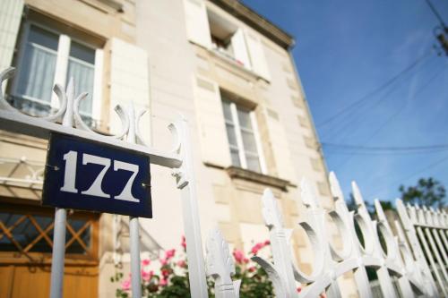 a sign in front of a building at Clos des Moulins in Poitiers