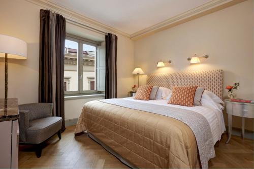 Postel nebo postele na pokoji v ubytování Rocco Forte Hotel Savoy