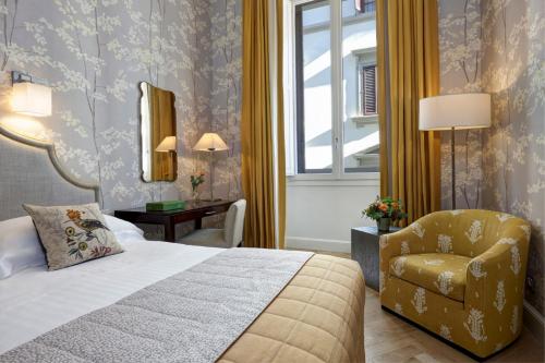 Postel nebo postele na pokoji v ubytování Rocco Forte Hotel Savoy