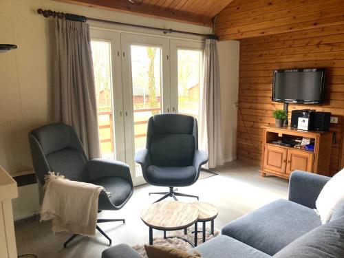 Ein Sitzbereich in der Unterkunft Familie Meys Chalets - Chalet 236 - La Boverie