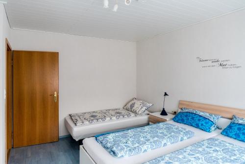 Cama ou camas em um quarto em Ferienwohnung Münch mit Balkon