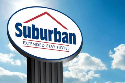 a sign for a suburban extended stay hotel at Suburban Studios Columbia - Harbison in Columbia