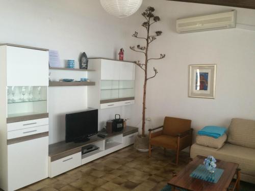 Posedenie v ubytovaní Apartment in Podgora with sea view, terrace, air conditioning, WiFi 134-3