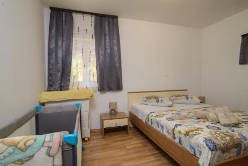 Posteľ alebo postele v izbe v ubytovaní Wawe Lux Holiday Home with pool