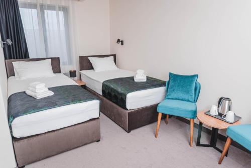 Postel nebo postele na pokoji v ubytování Hotel Aloha