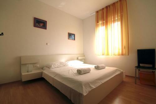 Posteľ alebo postele v izbe v ubytovaní Apartment in Zadar with balcony, air conditioning, WiFi 858-1