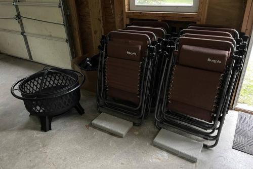 a group of brown chairs sitting in a room at Outdoor Playground on Lake and Close to Skiing in Windsor