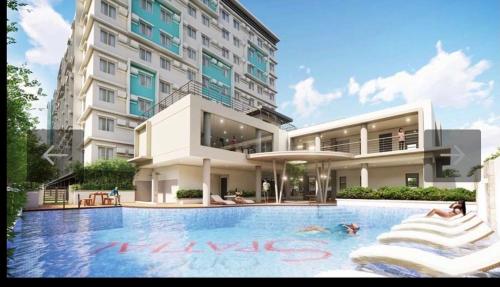 La alberca dentro o cerca de One Spatial Two Bedroom Condominium Unit with Pool and Gym free Netflix and wifi