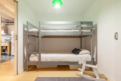 two bunk beds in a room with a hallway at Tarragona Circus in Tarragona