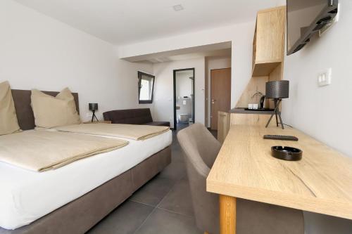 Postel nebo postele na pokoji v ubytování B&B villa Kovač