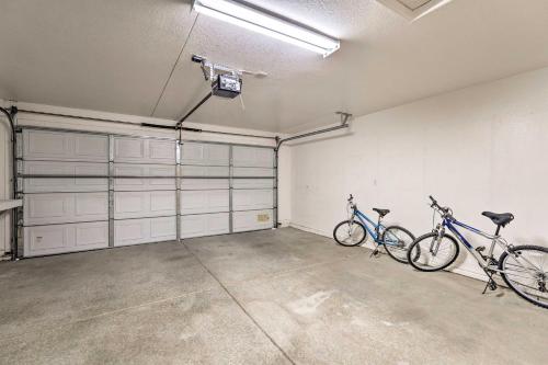 two bikes are parked in a garage at Kid-Friendly Kingman Home Near Parks and Dining in Kingman
