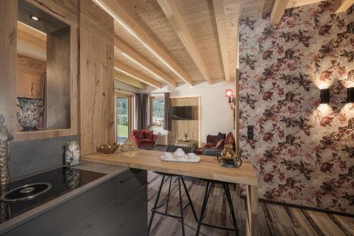 Zona de estar de Appartement Zillertal Klee mit Restaurant KleemenTine