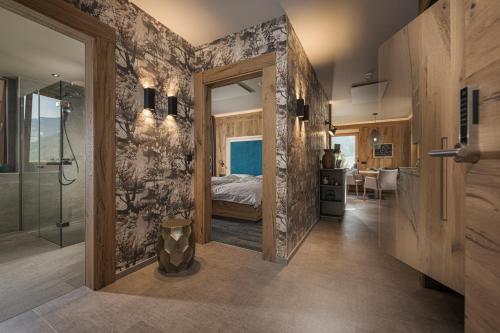 Cama o camas de una habitación en Appartement Zillertal Klee mit Restaurant KleemenTine
