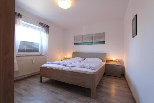 Ένα ή περισσότερα κρεβάτια σε δωμάτιο στο Kaiserhof Whg 5