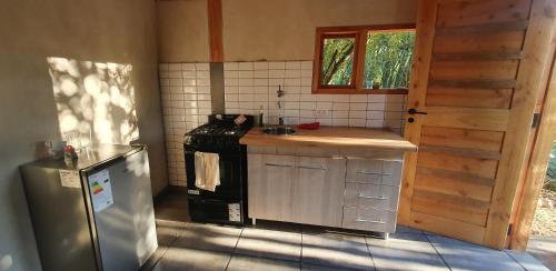 Kuchyň nebo kuchyňský kout v ubytování Casita Arco Iris