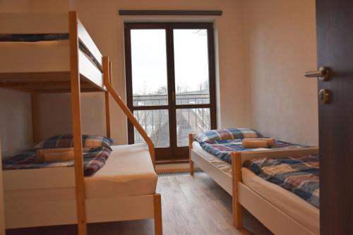 Postel nebo postele na pokoji v ubytování Apartmán198,cz