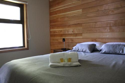 Ein Bett oder Betten in einem Zimmer der Unterkunft APART HOME COSTANERA