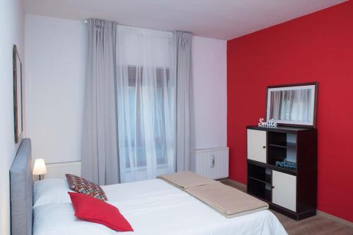 Posteľ alebo postele v izbe v ubytovaní Apartman Isabella