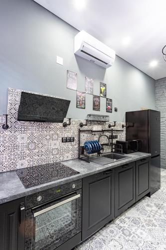 Una cocina o zona de cocina en Residence IRON CUBE