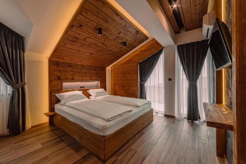 Postel nebo postele na pokoji v ubytování Вила Рустик / Villa Rustic
