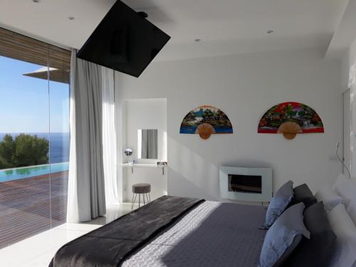 Voodi või voodid majutusasutuse Villa Luxury Paradise Suites toas