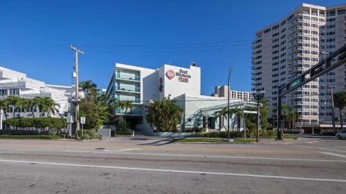 an empty street in a city with tall buildings at Best Western Plus Oceanside Inn in Fort Lauderdale