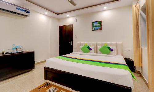 Ένα ή περισσότερα κρεβάτια σε δωμάτιο στο Itsy Hotels NV, Tapovan