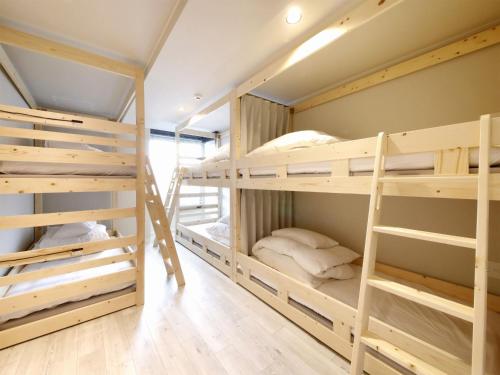 Poschodová posteľ alebo postele v izbe v ubytovaní Lestel Maru