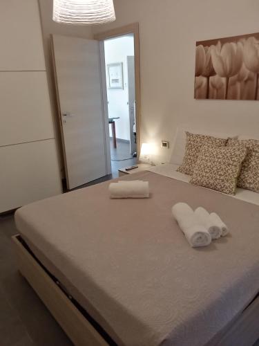 Ένα ή περισσότερα κρεβάτια σε δωμάτιο στο Profumi di Mare