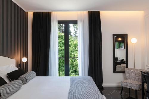 Ένα ή περισσότερα κρεβάτια σε δωμάτιο στο Locanda Appennino
