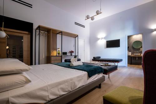 Krevet ili kreveti u jedinici u objektu Vespri Luxury Rooms & Suites