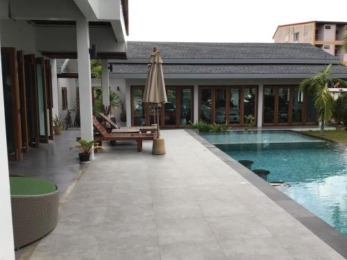 Бассейн в Baan Yaimai Boutique Samui или поблизости