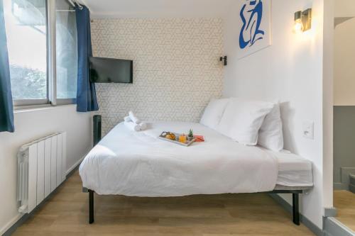 Cama o camas de una habitación en WS Tour Eiffel - Saint-Charles