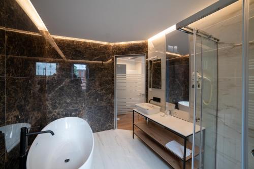 Koupelna v ubytování GRANDI 32 Boutique Residence