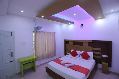 Ένα ή περισσότερα κρεβάτια σε δωμάτιο στο Chilanka Lake view Resort