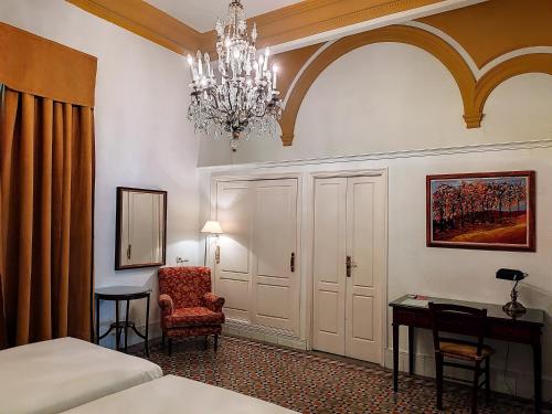 Posteľ alebo postele v izbe v ubytovaní Hotel Simon