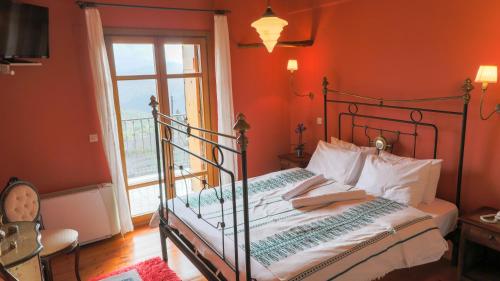 Postel nebo postele na pokoji v ubytování Hotel Papanikola