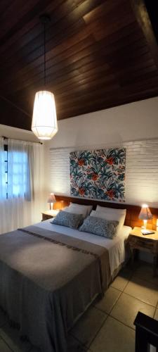 Hotel Tibau Lagoaにあるベッド