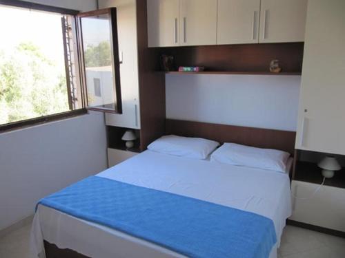 Posteľ alebo postele v izbe v ubytovaní Apartment in Sucuraj with sea view, terrace, air conditioning, WiFi 3354-1