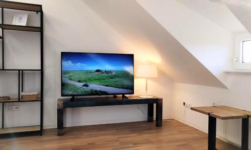 Super Apartments #1 mit Terrasse, #3 mit Aussicht und #7 mit Fernblick nahe Aachenにあるテレビまたはエンターテインメントセンター