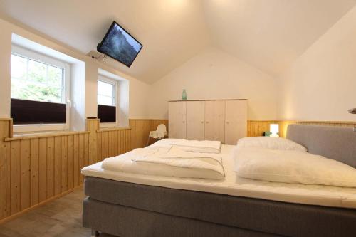 Postel nebo postele na pokoji v ubytování Haus Elisabeth Bootshaus