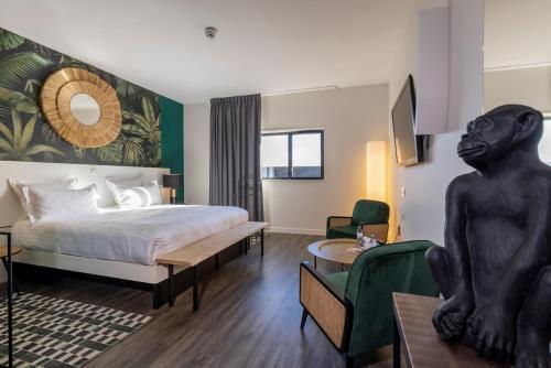 Postel nebo postele na pokoji v ubytování PADJA Hôtel & Spa Vannes