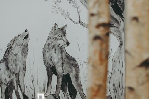 a drawing of wolves in the woods at Wilczarz in Duszniki Zdrój