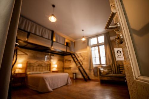 Che Juan Hostel BAにあるベッド