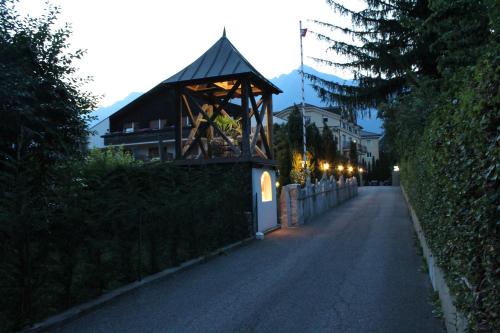 a small gazebo on the side of a street at Garni Weingut in Merano